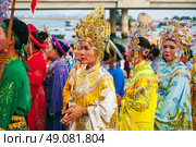 Vietnamese women in traditional Cham costumes near Po Nagar Towers in Nha Trang at a celebration. NHA Trang, Vietnam - April 17th, 2025. Редакционное фото, фотограф Корчагина Анастасия / Фотобанк Лори
