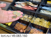 coins in the cash register. Стоковое фото, агентство Ingram Publishing / Фотобанк Лори