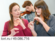 Learning ot play the recorder. Стоковое фото, агентство Ingram Publishing / Фотобанк Лори