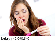 Woman shocked to find out she’s pregnant. Стоковое фото, агентство Ingram Publishing / Фотобанк Лори