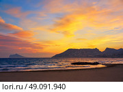 Calpe sunset in Mediterranean in cantal roig beach of spain. Стоковое фото, агентство Ingram Publishing / Фотобанк Лори