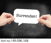 Surrender written on a speechbubble. Стоковое фото, агентство Ingram Publishing / Фотобанк Лори