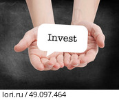 Invest written on a speechbubble. Стоковое фото, агентство Ingram Publishing / Фотобанк Лори