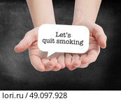 Lets quit smoking written on a speechbubble. Стоковое фото, агентство Ingram Publishing / Фотобанк Лори