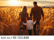 Golden Hour Embrace: A Familys Sunset Stroll Through the Wheat Field. Стоковое AI-изображение, AI-художник Данила Большаков / Фотобанк Лори
