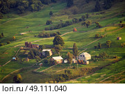 September rural scene in Carpathian mountains. Authentic village and fence. Стоковое фото, агентство Ingram Publishing / Фотобанк Лори