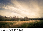 Hunting tower on a field in autumn scenery. Стоковое фото, агентство Ingram Publishing / Фотобанк Лори