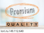Premium quality bade made of wooden blocks on a table. Стоковое фото, агентство Ingram Publishing / Фотобанк Лори