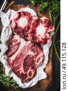 Raw meat for  Broth or soup with beef brisket and Ox tail , top view, close up. Стоковое фото, агентство Ingram Publishing / Фотобанк Лори