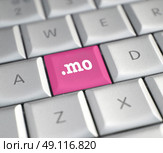 The .mo domain name on a keyboard key. Стоковое фото, агентство Ingram Publishing / Фотобанк Лори