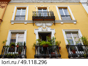 Seville Macarena barrio facades in Sevilla Spain. Стоковое фото, агентство Ingram Publishing / Фотобанк Лори