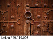 Zamora detail of old aged wood door in Spain by the via de la Plata way. Стоковое фото, агентство Ingram Publishing / Фотобанк Лори