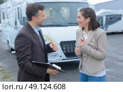 female driver holding happy to get driving results. Стоковое фото, агентство Ingram Publishing / Фотобанк Лори