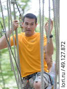 man doing a three trail. Редакционное фото, агентство Ingram Publishing / Фотобанк Лори
