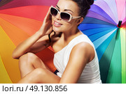 Smiling lady taking a sunbath. Стоковое фото, агентство Ingram Publishing / Фотобанк Лори