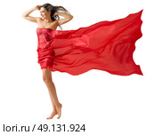 Young woman on the wind isolated. Стоковое фото, агентство Ingram Publishing / Фотобанк Лори