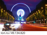 Champs Elysees in Paris and Concorde sunset at France. Стоковое фото, агентство Ingram Publishing / Фотобанк Лори