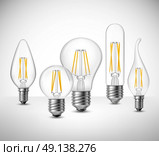 Filament Led Lightbulbs Realistic Set. Realistic set of filament led lightbulbs on grey surface vector illustration. Стоковая иллюстрация, агентство Ingram Publishing / Фотобанк Лори