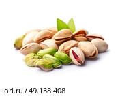 Pistachio nuts with leaves. Стоковое фото, фотограф Волошина Мария Ивановна / Фотобанк Лори