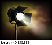 Spotlight Blurry Misty Dark Background Poster . Classical cinematographic movie shooting realistic spotlight poster with dark blurry misty with smoke effect background vector illustration . Стоковая иллюстрация, агентство Ingram Publishing / Фотобанк Лори