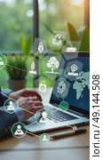 A person in a business suit working on a laptop with virtual icons related to environmental projects, presenting trees, ecological symbols and other signs. Стоковое AI-видео, аниматор Sergey Grishin / Фотобанк Лори