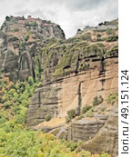 The monasteries on high rock mountain, Meteora, Greece. Стоковое фото, агентство Ingram Publishing / Фотобанк Лори