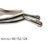 spurs  with star roll at white background. Стоковое фото, агентство Ingram Publishing / Фотобанк Лори