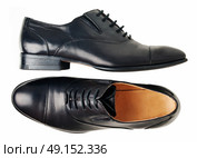 Black classic shoes isolated. Стоковое фото, агентство Ingram Publishing / Фотобанк Лори