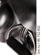 stirrup at dressage saddle. close up. Стоковое фото, агентство Ingram Publishing / Фотобанк Лори