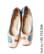 Elegant fashinable flat shoes isolated on white. Стоковое фото, агентство Ingram Publishing / Фотобанк Лори