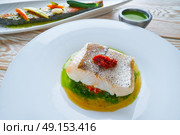 Atlantic hake over dried tomato ratatouille recipe. Стоковое фото, агентство Ingram Publishing / Фотобанк Лори