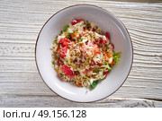 Cesar caesar salad with tomato cheese lettuce and sauce. Стоковое фото, агентство Ingram Publishing / Фотобанк Лори
