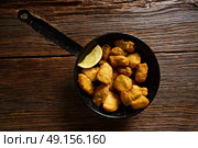 Tapas Adobo fried fish andalusian tapa from spain. Стоковое фото, агентство Ingram Publishing / Фотобанк Лори
