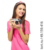Young travelling girl isolated on white. Стоковое фото, агентство Ingram Publishing / Фотобанк Лори