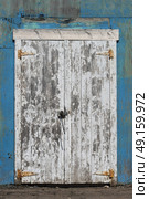Detail of weathered door, Cabot Beach Provincial Park, Malpeque Bay, Prince Edward Island, Canada. Стоковое фото, агентство Ingram Publishing / Фотобанк Лори