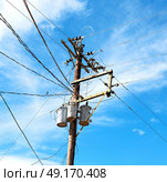 blur  in  philippines   a electric pole with transformer and wire  the cloudy sky. Стоковое фото, агентство Ingram Publishing / Фотобанк Лори