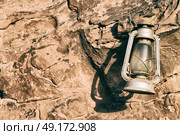 in the rock desert of jordan an antique old fashioned lamp isolated. Стоковое фото, агентство Ingram Publishing / Фотобанк Лори