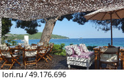 Beautiful Ambelakia beach on Skiathos island in Greece, summer day in June. Стоковое фото, агентство Ingram Publishing / Фотобанк Лори