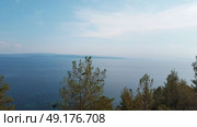 Beautiful beach on Skiathos island in Greece, windy summer day in June. Стоковое фото, агентство Ingram Publishing / Фотобанк Лори