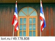 temple   in  bangkok thailand incision red venetian blind and terrace waving flag . Стоковое фото, агентство Ingram Publishing / Фотобанк Лори