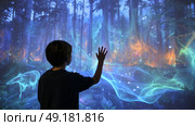 Child using virtual reality headset for metaverse, child looking into VR glasses. Little girl boy with futuristic glasses having fun, teenager playing video games. Technology, simulator, oculus future. Стоковое AI-изображение, AI-художник ALLA YURTAYEVA / Фотобанк Лори