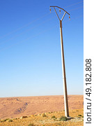   utility pole in africa morocco energy and distribution pylon. Стоковое фото, агентство Ingram Publishing / Фотобанк Лори