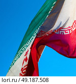 in iran blur  iranian waving flag  the blue sky and wind. Стоковое фото, агентство Ingram Publishing / Фотобанк Лори