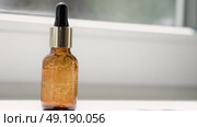 Natural oil cosmetics. Dropper glass amber Bottle Mock-Up. Oily cosmetic pipette. Face and body treatment. Spa concept. Mineral organic liquid. Front view. Beauty products. Blank packaging on white. Стоковое видео, видеограф Марина Демидюк / Фотобанк Лори