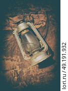 in the rock desert of jordan an antique old fashioned lamp isolated. Стоковое фото, агентство Ingram Publishing / Фотобанк Лори