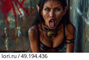 A woman in detailed fantasy cosplay posing fiercely against a graffitied urban wall, showing off her elaborate costume in natural daylight. Стоковое AI-изображение, AI-художник Данила Большаков / Фотобанк Лори