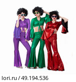 Disco style girls in colorful flared suits and African American wigs on a white background. Seventies or eighties style. Стоковое фото, фотограф Лазаренко Светлана / Фотобанк Лори