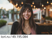 A woman standing in front of a restaurant making a humorous facial expression. Стоковое AI-изображение, AI-художник Данила Большаков / Фотобанк Лори