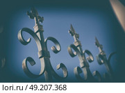 in the sky an iron fence prospective and abstracr background. Стоковое фото, агентство Ingram Publishing / Фотобанк Лори