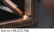 Laser welding machine. Shot on super slow motion camera 1000 fps. Laser welding is shown in close-up. Стоковое видео, видеограф Андрей Армягов / Фотобанк Лори
